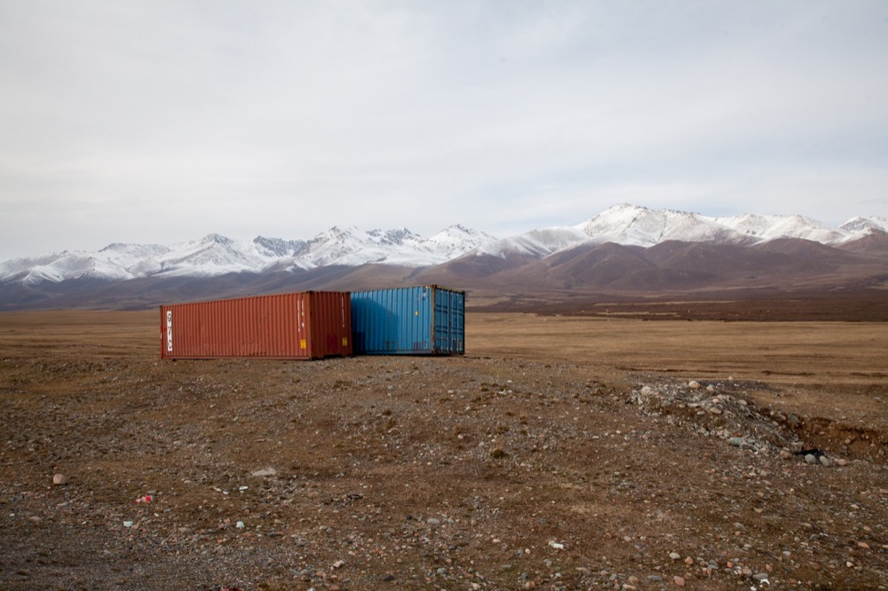 Empty shipping containers in the highlands of Kyrgyzstan. © 2014 Martin Saxer